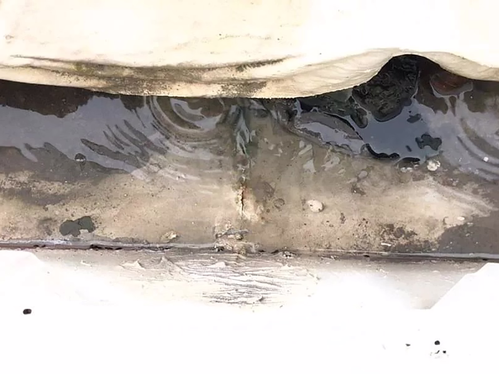 GC Roofing Overflowing Water